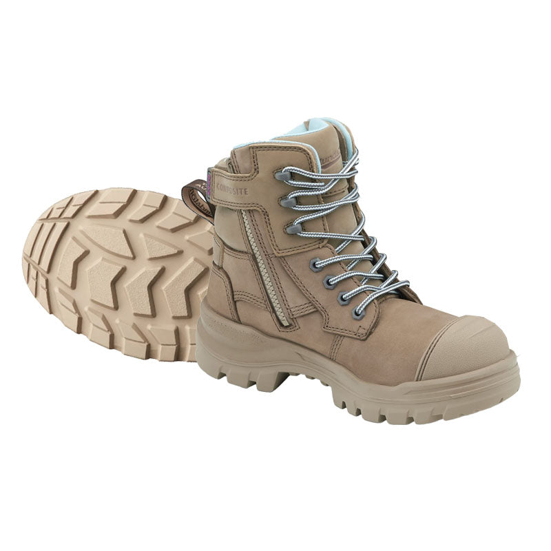 Tan hiking boot with laces on a white background