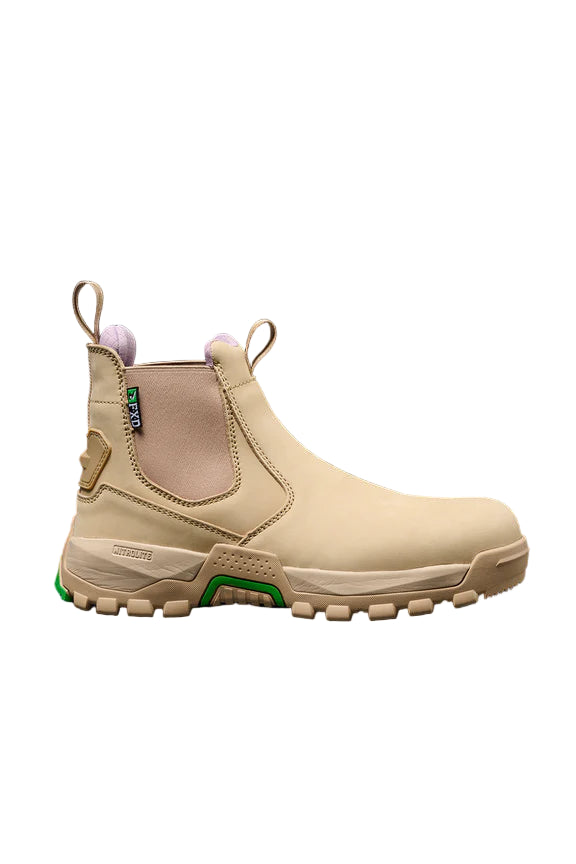 Beige boot with green accents on a dark blue background