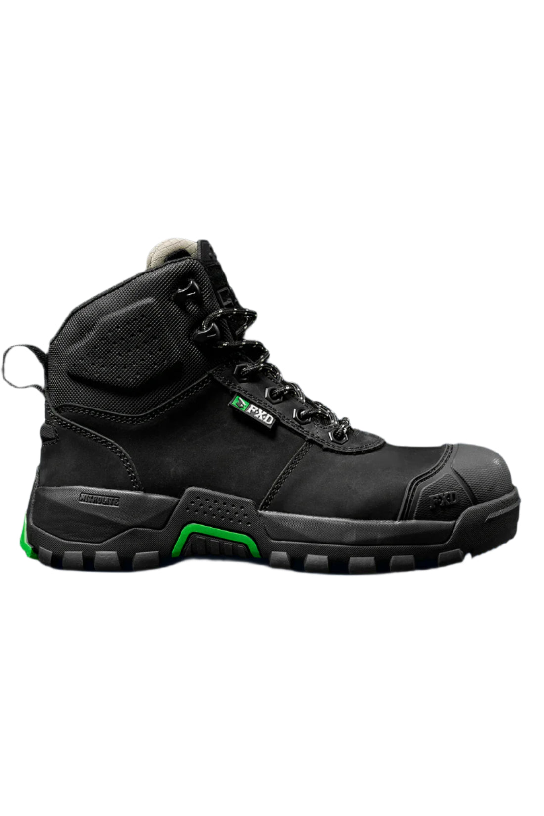 Black hiking boot with green accents on a black background