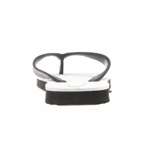Black and white Double Plugger Thong with rubber upper and durable design.